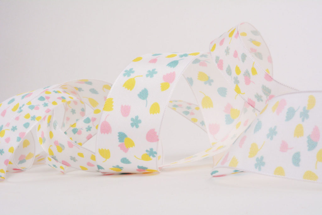 i694 – Printed metallic brass ribbon “Flower” Satab